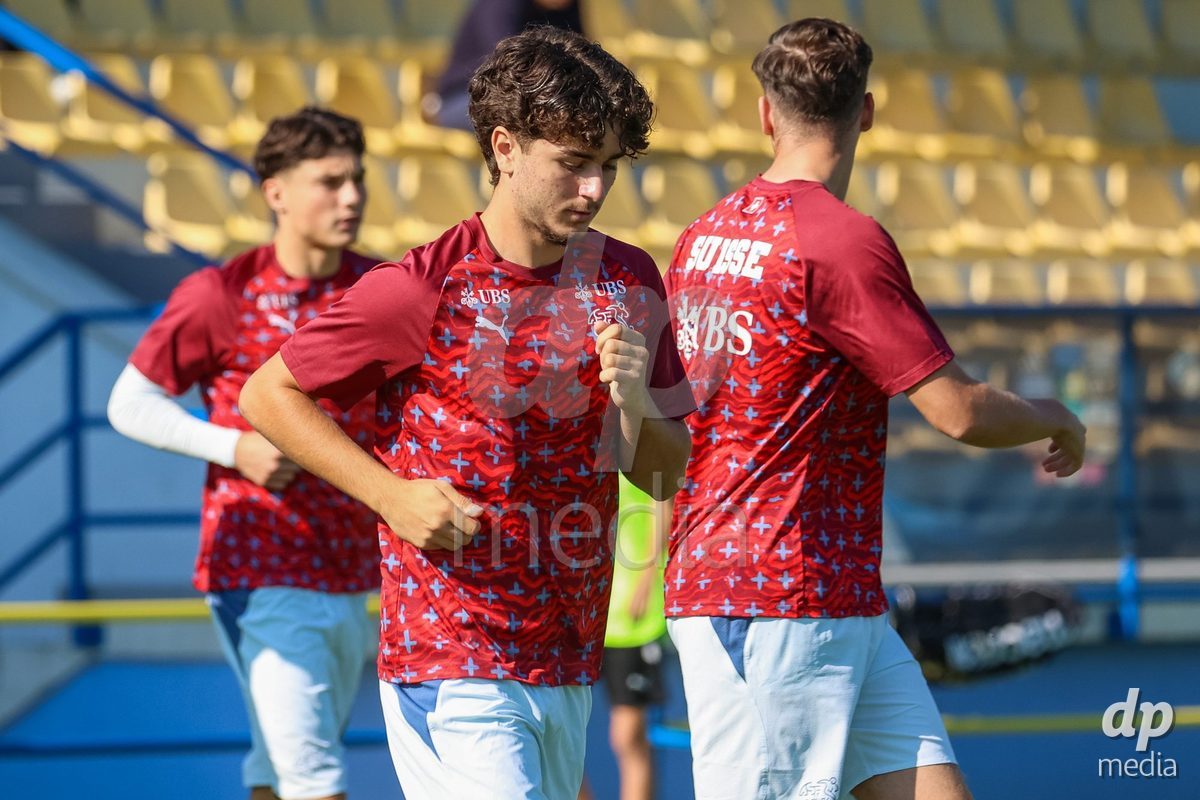DUNAJSKA LUZNA, SLOVAKIA - SEPTEMBER 28: Switzerland team warm-up the International Friendly football match between Kazakhstan U19 and Switzerland U19 on September 28, 2026 in Dunajska Luzna, Slovakia.