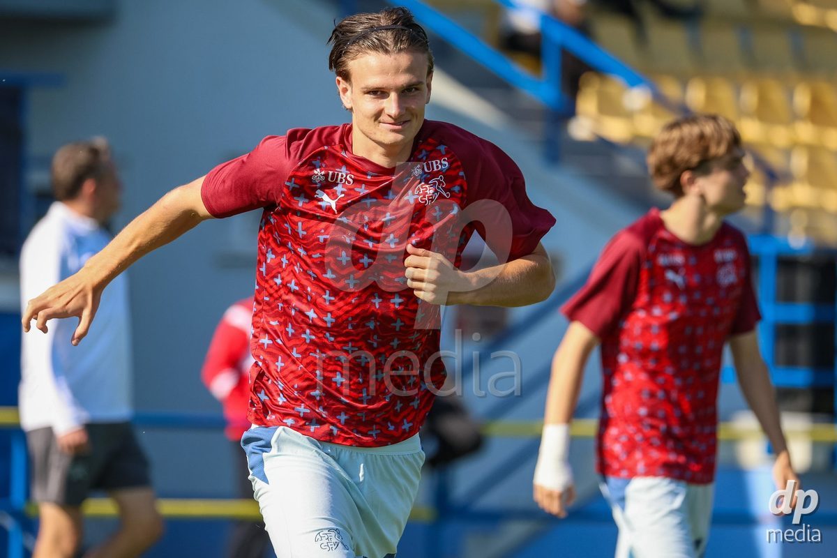 DUNAJSKA LUZNA, SLOVAKIA - SEPTEMBER 28: Switzerland team warm-up the International Friendly football match between Kazakhstan U19 and Switzerland U19 on September 28, 2026 in Dunajska Luzna, Slovakia.