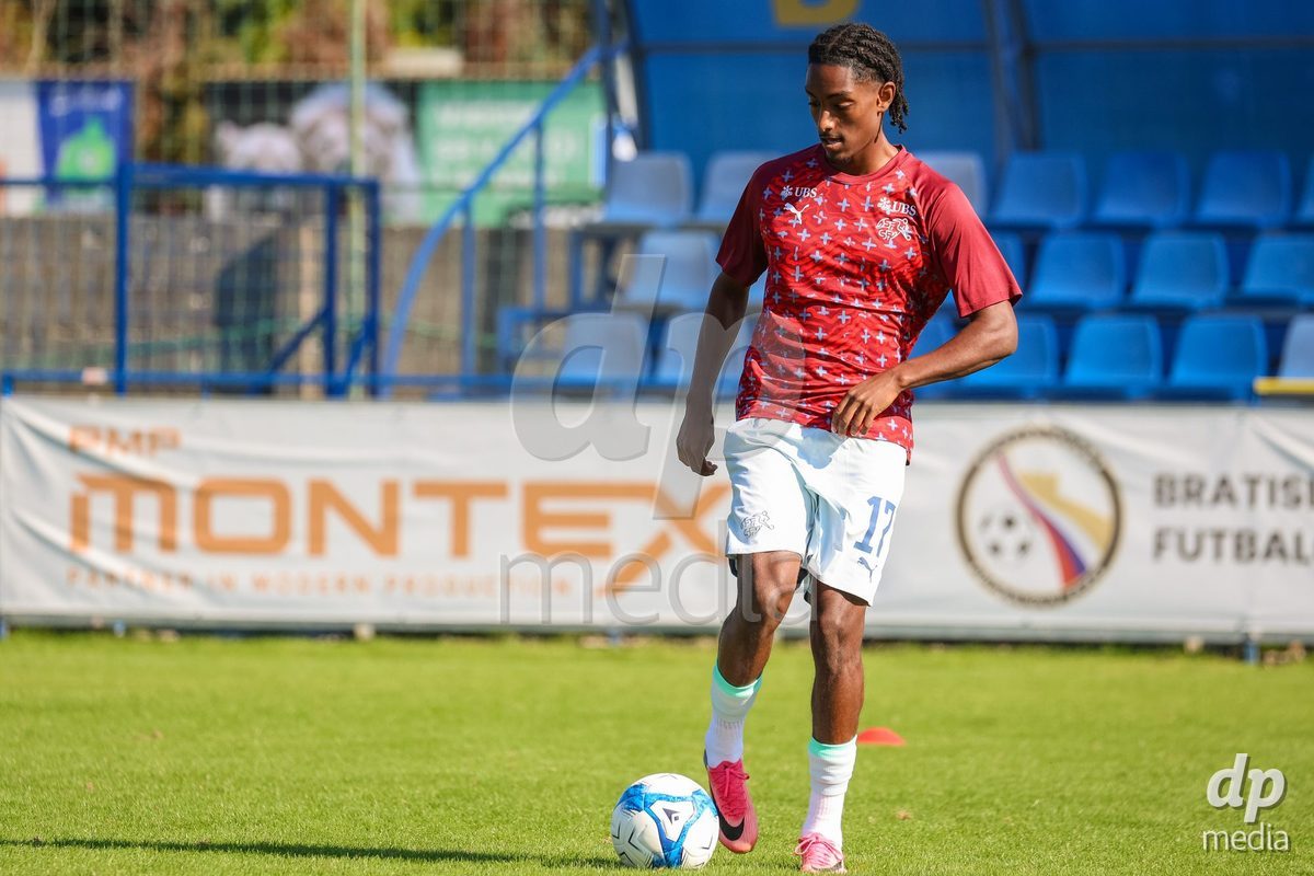 DUNAJSKA LUZNA, SLOVAKIA - SEPTEMBER 28: Switzerland team warm-up the International Friendly football match between Kazakhstan U19 and Switzerland U19 on September 28, 2026 in Dunajska Luzna, Slovakia.