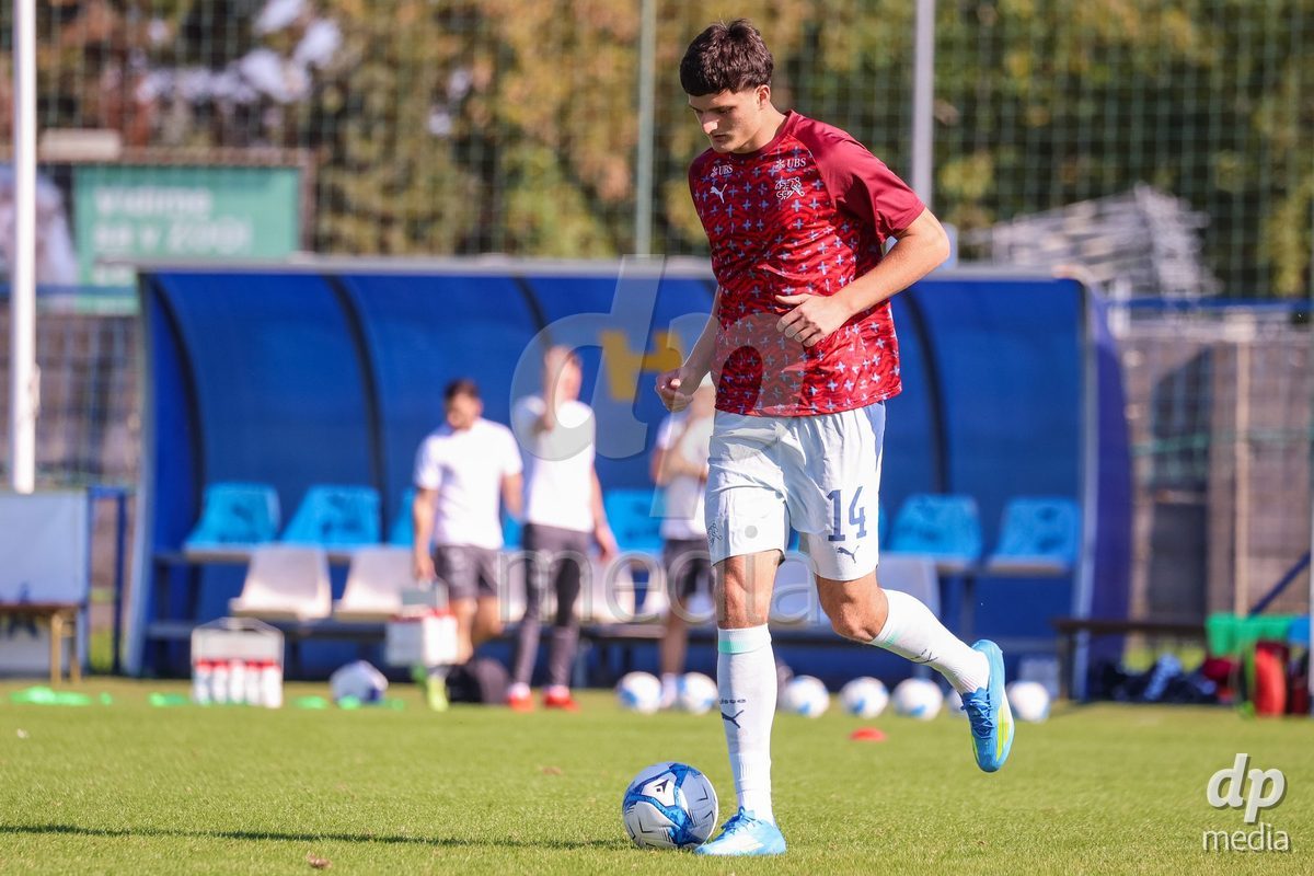 DUNAJSKA LUZNA, SLOVAKIA - SEPTEMBER 28: Switzerland team warm-up the International Friendly football match between Kazakhstan U19 and Switzerland U19 on September 28, 2026 in Dunajska Luzna, Slovakia.