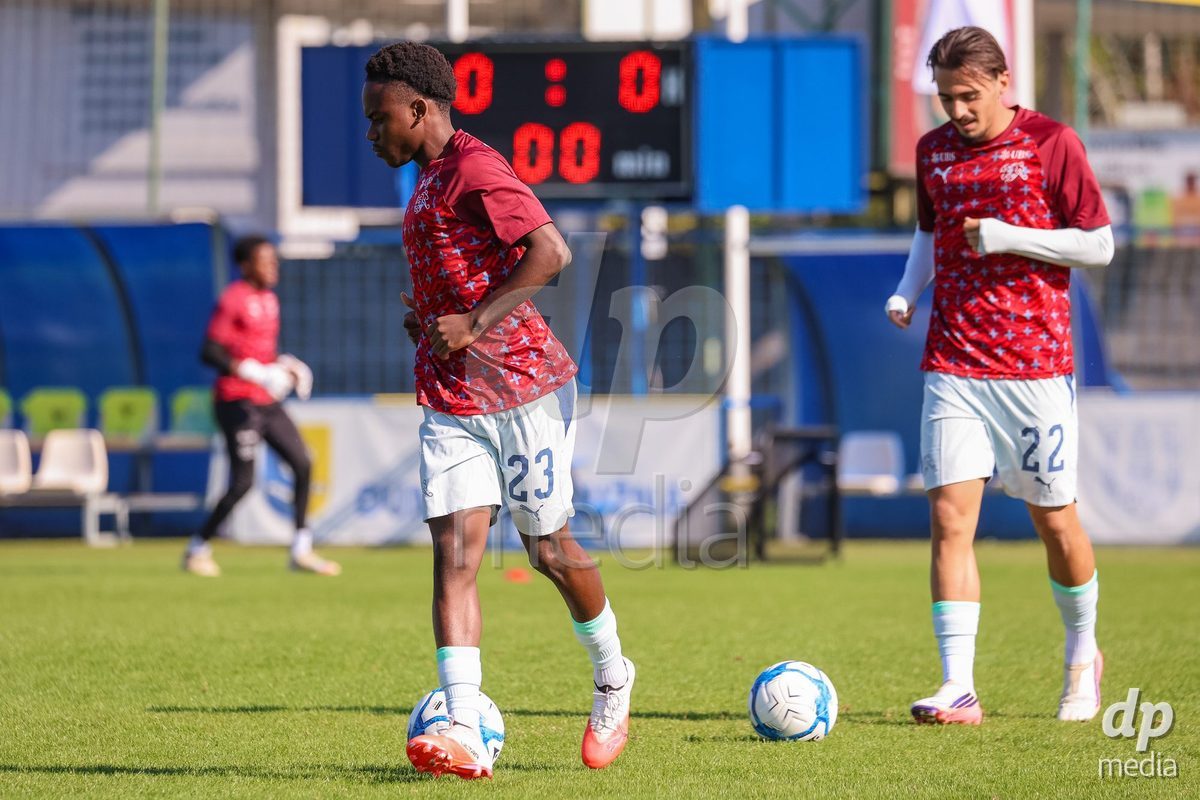 DUNAJSKA LUZNA, SLOVAKIA - SEPTEMBER 28: Switzerland team warm-up the International Friendly football match between Kazakhstan U19 and Switzerland U19 on September 28, 2026 in Dunajska Luzna, Slovakia.