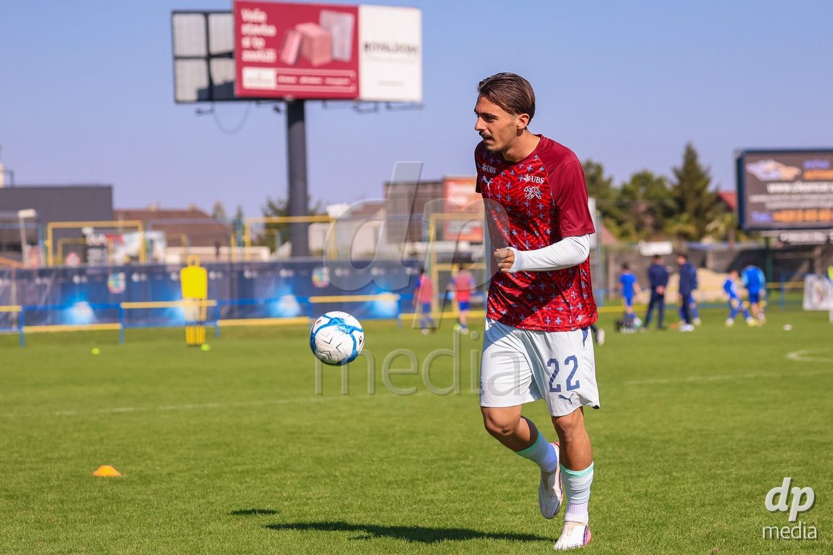 DUNAJSKA LUZNA, SLOVAKIA - SEPTEMBER 28: Switzerland team warm-up the International Friendly football match between Kazakhstan U19 and Switzerland U19 on September 28, 2026 in Dunajska Luzna, Slovakia.
