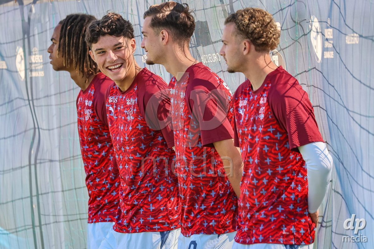DUNAJSKA LUZNA, SLOVAKIA - SEPTEMBER 28: Switzerland team warm-up the International Friendly football match between Kazakhstan U19 and Switzerland U19 on September 28, 2026 in Dunajska Luzna, Slovakia.