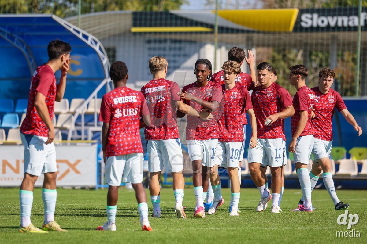 DUNAJSKA LUZNA, SLOVAKIA - SEPTEMBER 28: Switzerland team warm-up the International Friendly football match between Kazakhstan U19 and Switzerland U19 on September 28, 2026 in Dunajska Luzna, Slovakia.