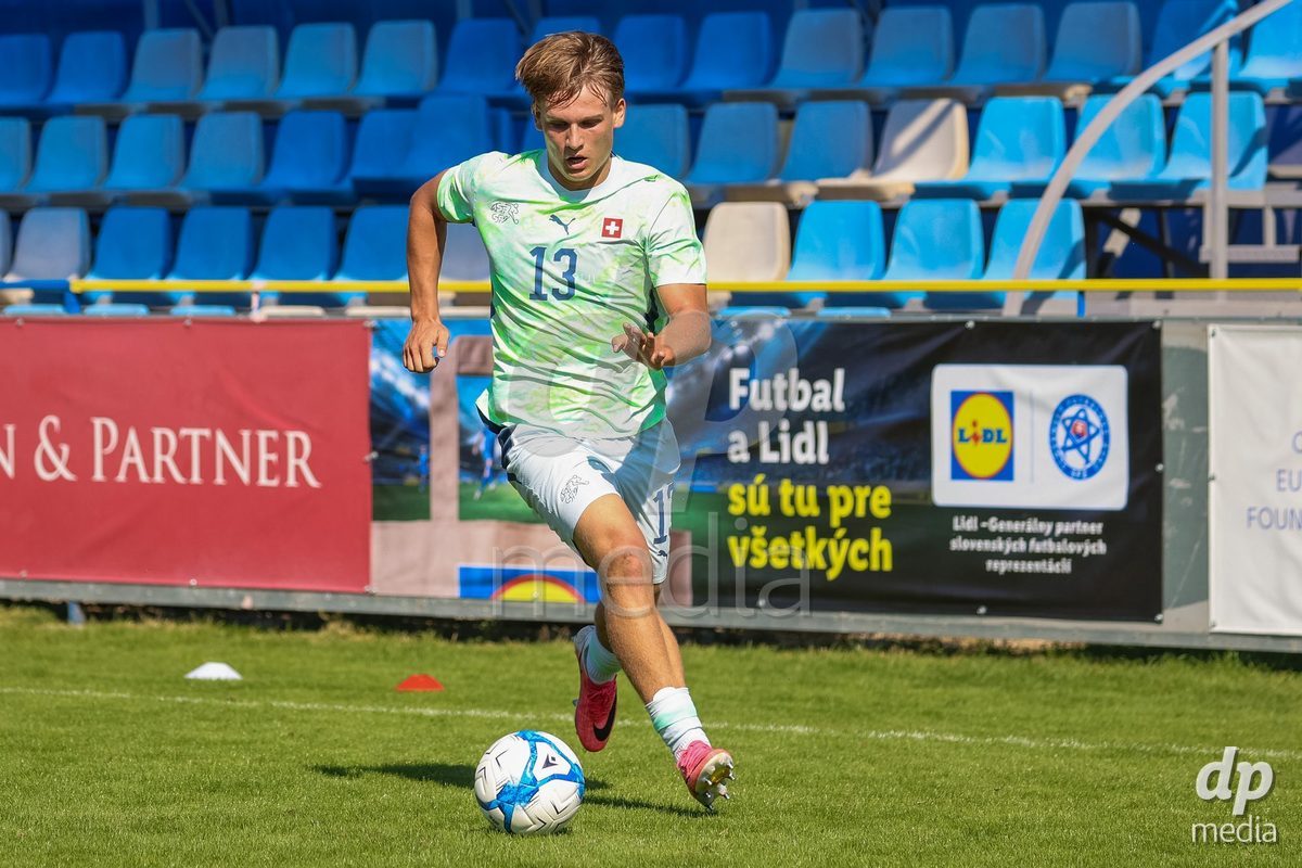 DUNAJSKA LUZNA, SLOVAKIA - SEPTEMBER 28: Justin Englin 13 of Switzerland controls the ball during the International Friendly football match between Kazakhstan U19 and Switzerland U19 on September 28, 2026 in Dunajska Luzna, Slovakia.