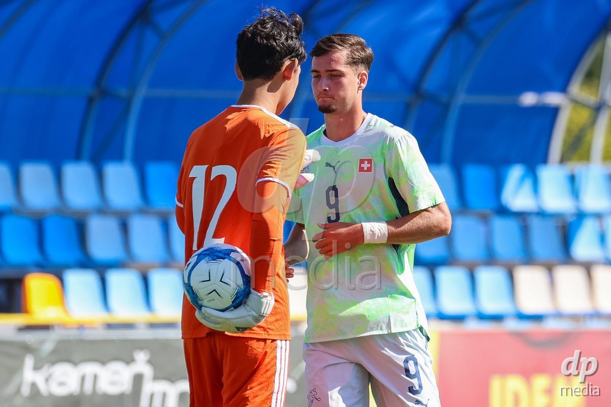 DUNAJSKA LUZNA, SLOVAKIA - SEPTEMBER 28: Ilija Despotovic 9 of Switzerland struggle for the ball during the International Friendly football match between Kazakhstan U19 and Switzerland U19 on September 28, 2026 in Dunajska Luzna, Slovakia.