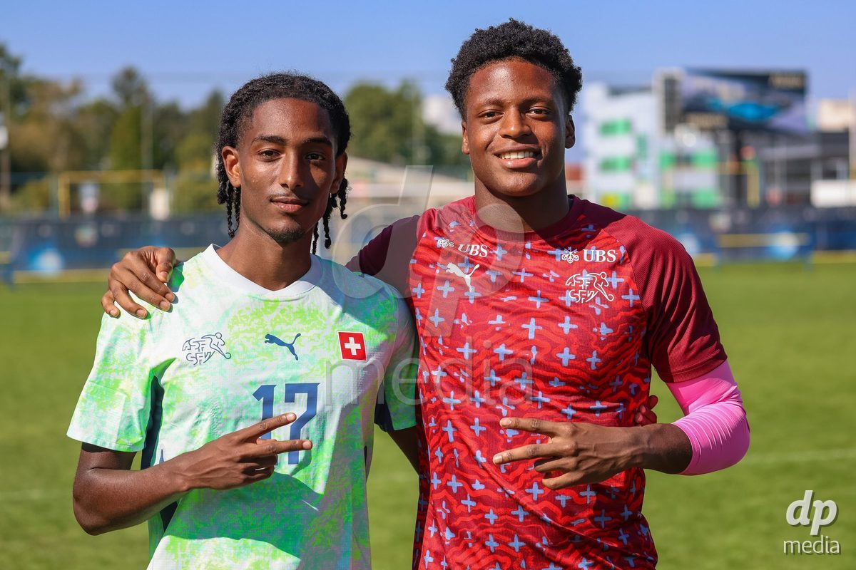 DUNAJSKA LUZNA, SLOVAKIA - SEPTEMBER 28: Kader Lionel Cherif 21 and Josiah Seyfu 17 of Switzerland  the International Friendly football match between Kazakhstan U19 and Switzerland U19 on September 28, 2026 in Dunajska Luzna, Slovakia.