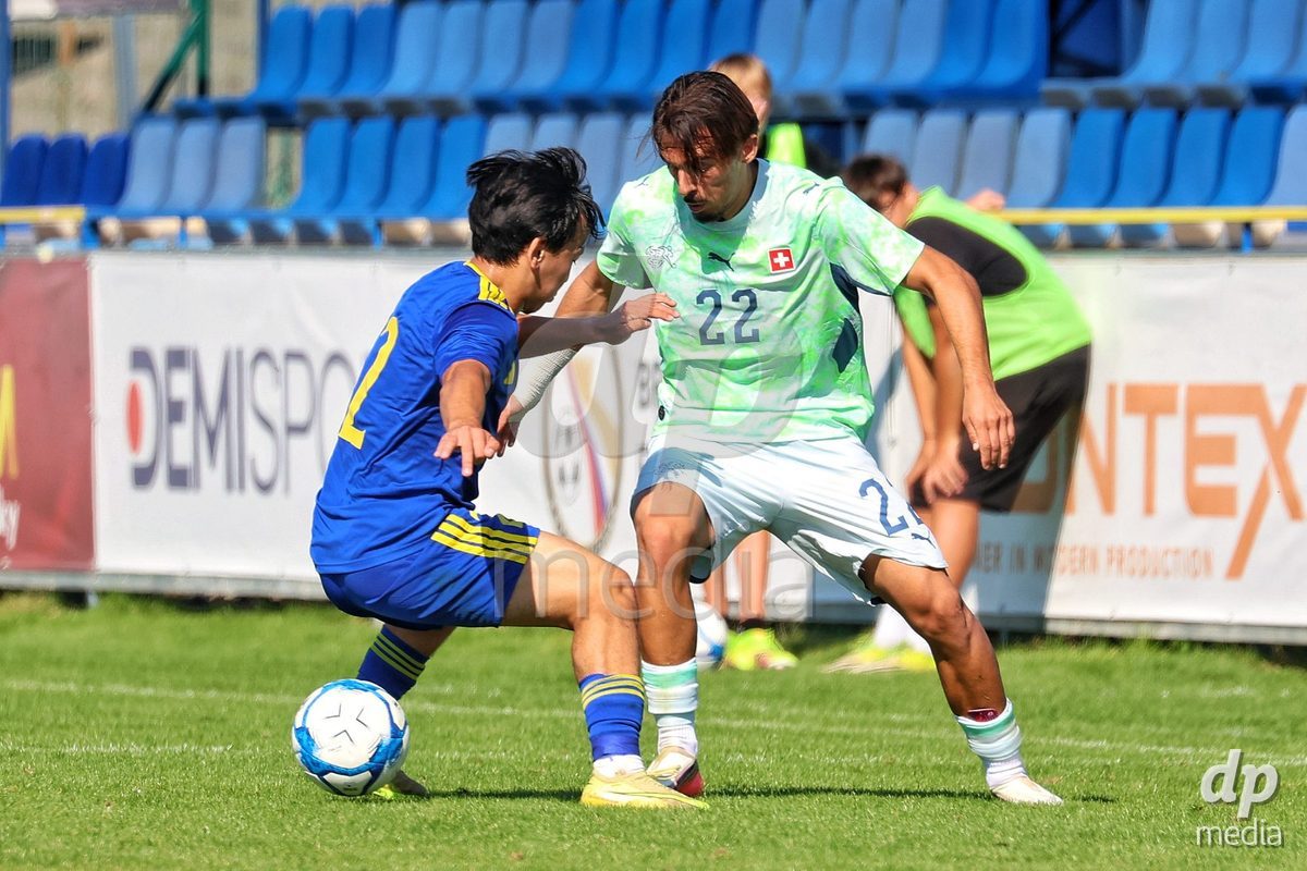DUNAJSKA LUZNA, SLOVAKIA - SEPTEMBER 28: Adrien Llukes 22 of Switzerland controls the ball during the International Friendly football match between Kazakhstan U19 and Switzerland U19 on September 28, 2026 in Dunajska Luzna, Slovakia.