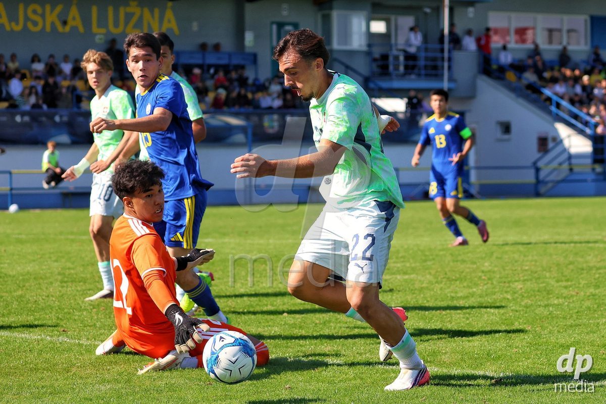 DUNAJSKA LUZNA, SLOVAKIA - SEPTEMBER 28: Adrien Llukes 22 of Switzerland controls the ball during the International Friendly football match between Kazakhstan U19 and Switzerland U19 on September 28, 2026 in Dunajska Luzna, Slovakia.