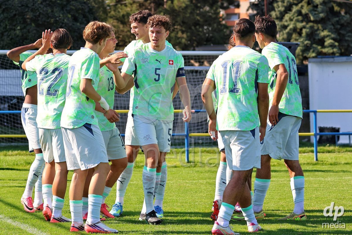 DUNAJSKA LUZNA, SLOVAKIA - SEPTEMBER 28:  Switzerland team goal celebration struggle for the ball during the friendly international football match between Kazakhstan U19 and Switzerland U19 on September 28, 2026 in Dunajska Luzna, Slovakia.