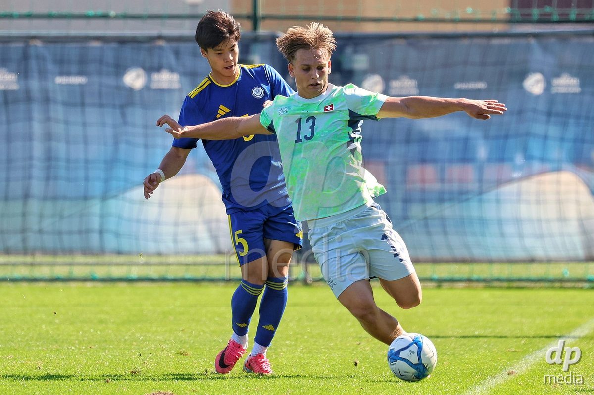 DUNAJSKA LUZNA, SLOVAKIA - SEPTEMBER 28: Eglin 13 of Switzerland controls the ball during the International Friendly football match between Kazakhstan U19 and Switzerland U19 on September 28, 2026 in Dunajska Luzna, Slovakia.