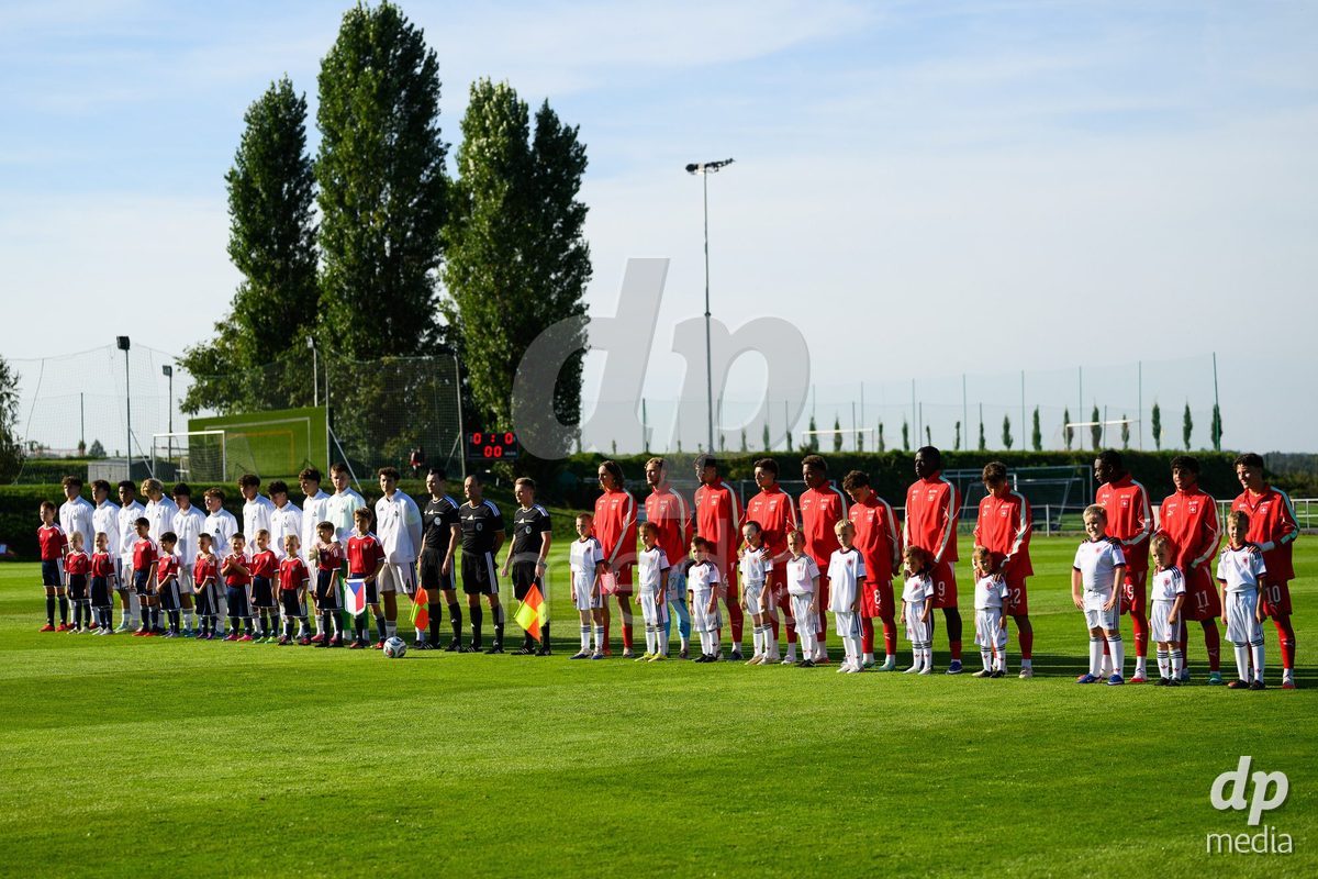 KOSMONSY, CZECH REPUBLIC - SEPTEMBER 28: The Czech and Swiss teams during the national anthem during  the International Friendly match between Czech Republic U18 and Switzerland U18 on September 28, 2026 in Kosmonsy, Czech Republic.