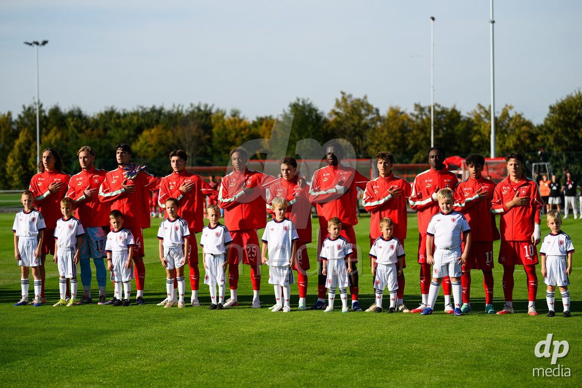 KOSMONSY, CZECH REPUBLIC - SEPTEMBER 28: The Swiss teams during the national anthem during  the International Friendly match between Czech Republic U18 and Switzerland U18 on September 28, 2026 in Kosmonsy, Czech Republic.