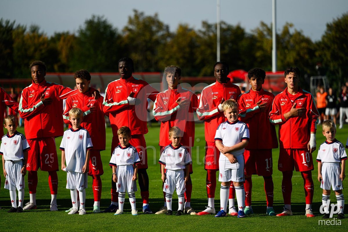 KOSMONSY, CZECH REPUBLIC - SEPTEMBER 28: The Swiss teams during the national anthem during  the International Friendly match between Czech Republic U18 and Switzerland U18 on September 28, 2026 in Kosmonsy, Czech Republic.