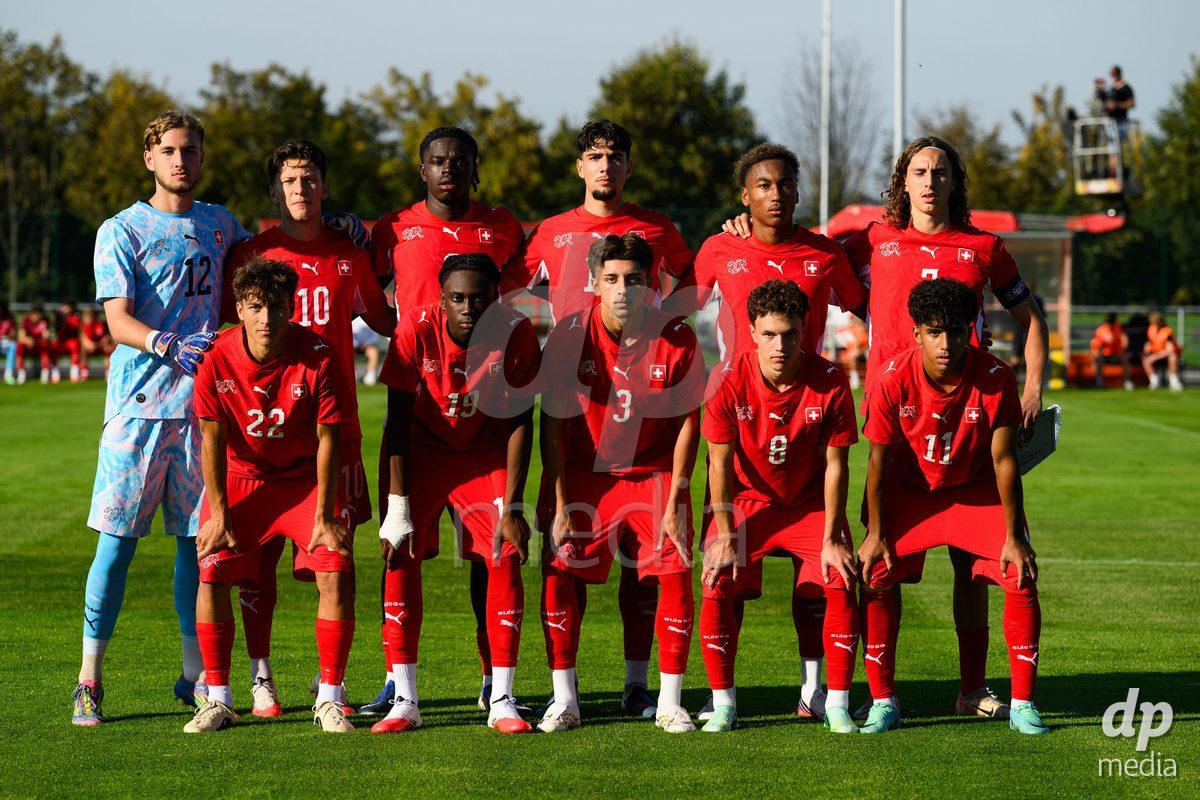 KOSMONSY, CZECH REPUBLIC - SEPTEMBER 28: The Swiss team during the national anthem during the International Friendly match between Czech Republic U18 and Switzerland U18 on September 28, 2026 in Kosmonsy, Czech Republic.