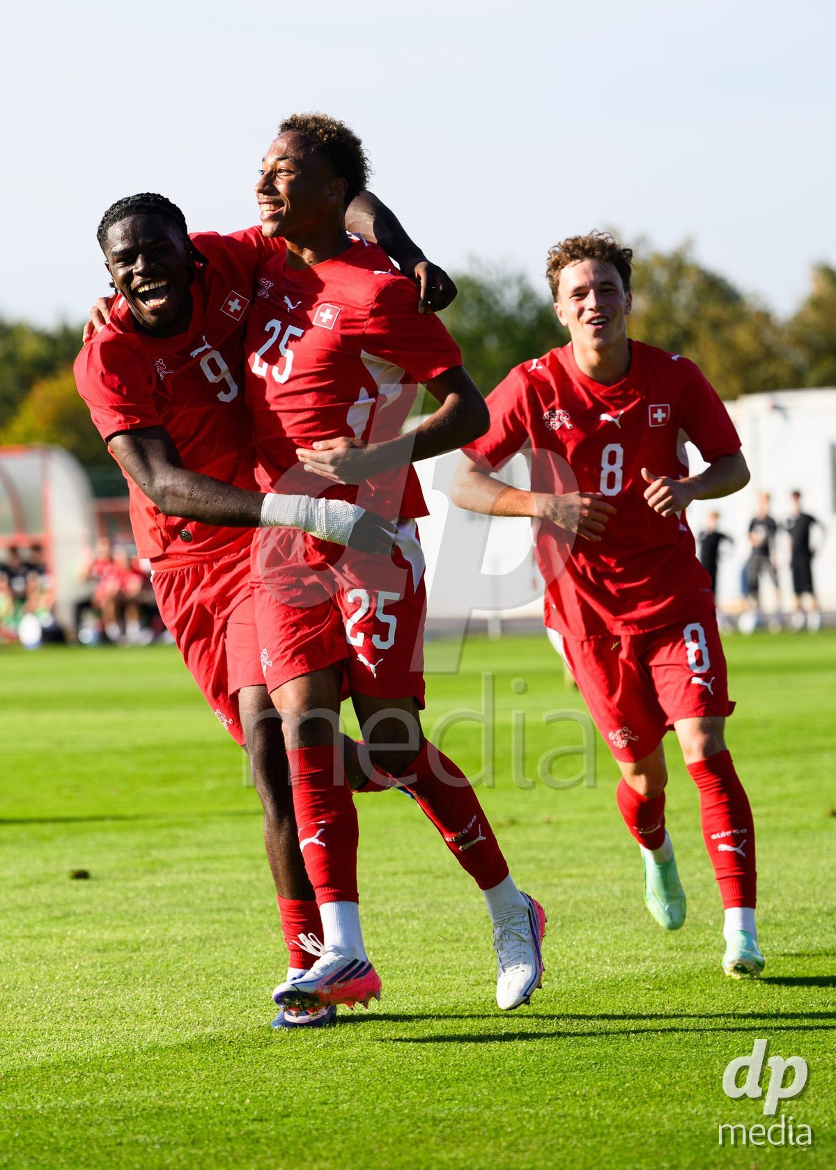 KOSMONSY, CZECH REPUBLIC - SEPTEMBER 28: Shedrach Ogbodu (left), Mathis Dind and Stefan Furundzic of Switzerland celebrate the opening goal during the International Friendly match between Czech Republic U18 and Switzerland U18 on September 28, 2026 in Kosmonsy, Czech Republic.