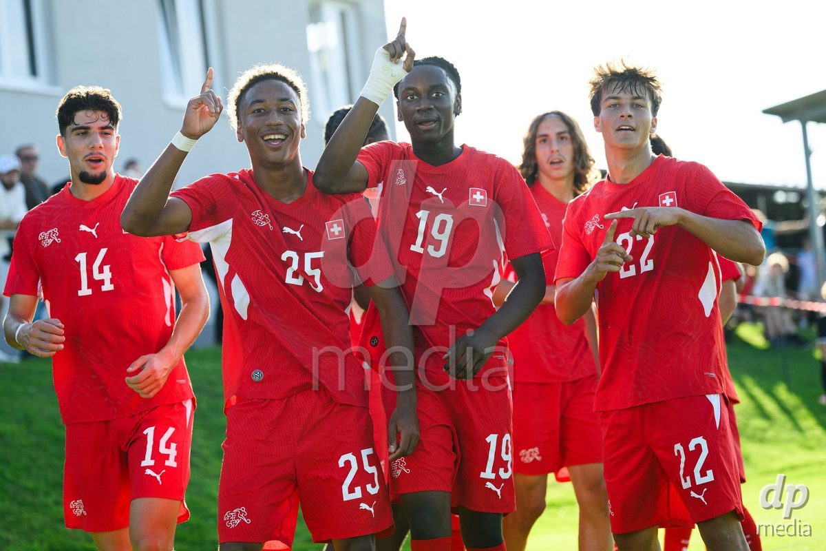 KOSMONSY, CZECH REPUBLIC - SEPTEMBER 28: Players of Switzerland L-R: Silvio Iuliano, Mathis Dind, Bright Ocran and Gregorijan Mihajlovski celebrate the opening goal during the International Friendly match between Czech Republic U18 and Switzerland U18 on September 28, 2026 in Kosmonsy, Czech Republic.
