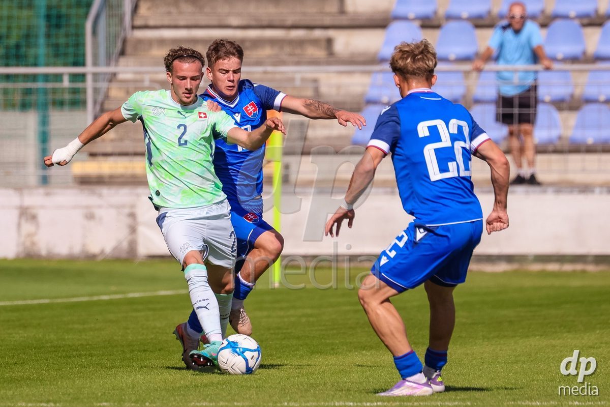 SENEC, SLOVAKIA - OCTOBER 1: Marco Correia Lopes Lebre 2 of Switzerland struggle for the ball during the International Friendly football match between Slovakia U19 and Switzerland U19 at NTC Senec on October on 1st October 2026 in Senec, Slovakia.