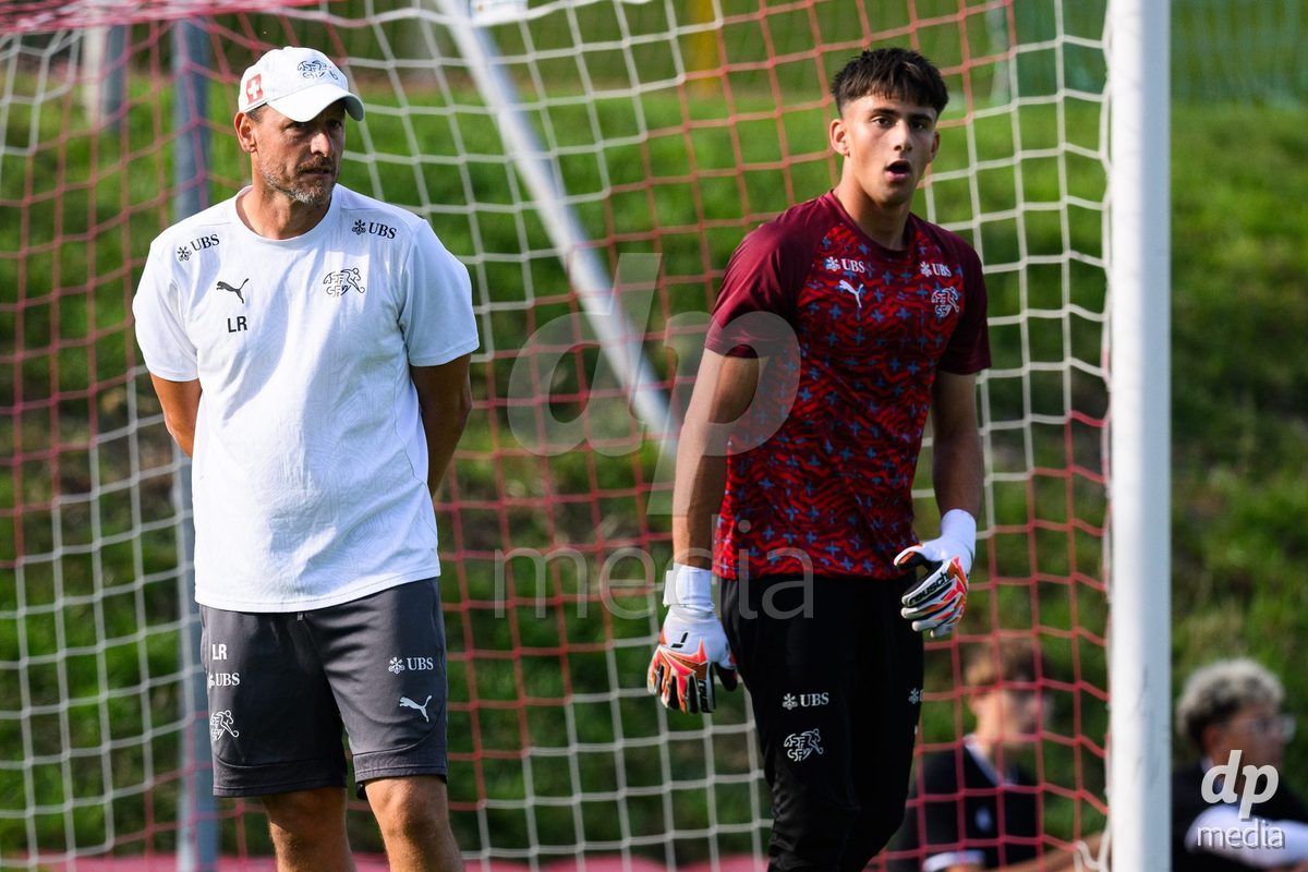 KOSMONSY, CZECH REPUBLIC - SEPTEMBER 30: Goalkeeper coach Luca Redaelli of Switzerland and Dylan Sgarbi during warm up before the International Friendly match between Switzerland U18 and Greece U18 on September 30, 2026 in Kosmonsy, Czech Republic.