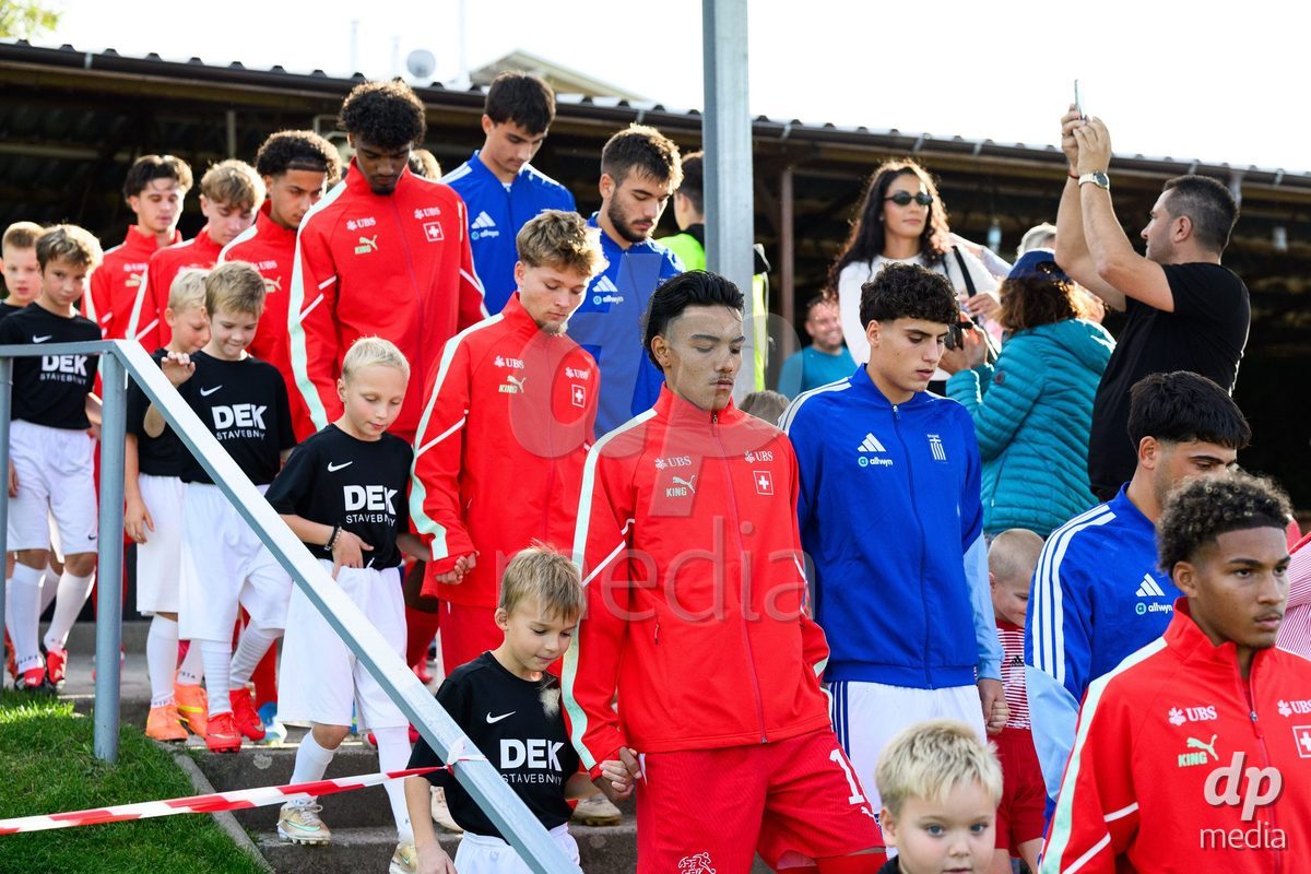 KOSMONSY, CZECH REPUBLIC - SEPTEMBER 30: Teams of Switzerland and Greece taking the field for the International Friendly match between Switzerland U18 and Greece U18 on September 30, 2026 in Kosmonsy, Czech Republic.