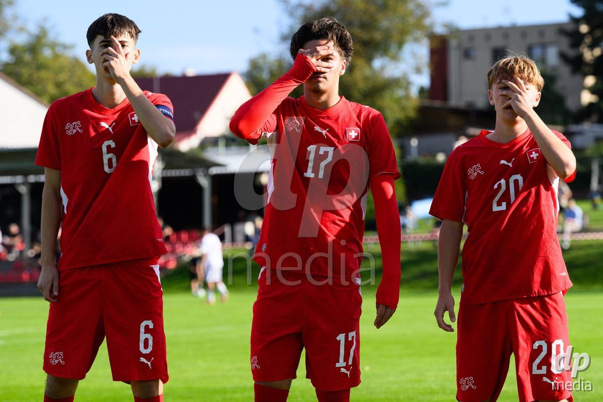KOSMONSY, CZECH REPUBLIC - SEPTEMBER 30: Swiss players Aldin Smajic (no.6), Timo Wiesner (no.17) and Luc Gigon (no.20) celebrate the goal to make it 1–0 during the International Friendly match between Switzerland U18 and Greece U18 on September 30, 2026 in Kosmonsy, Czech Republic.