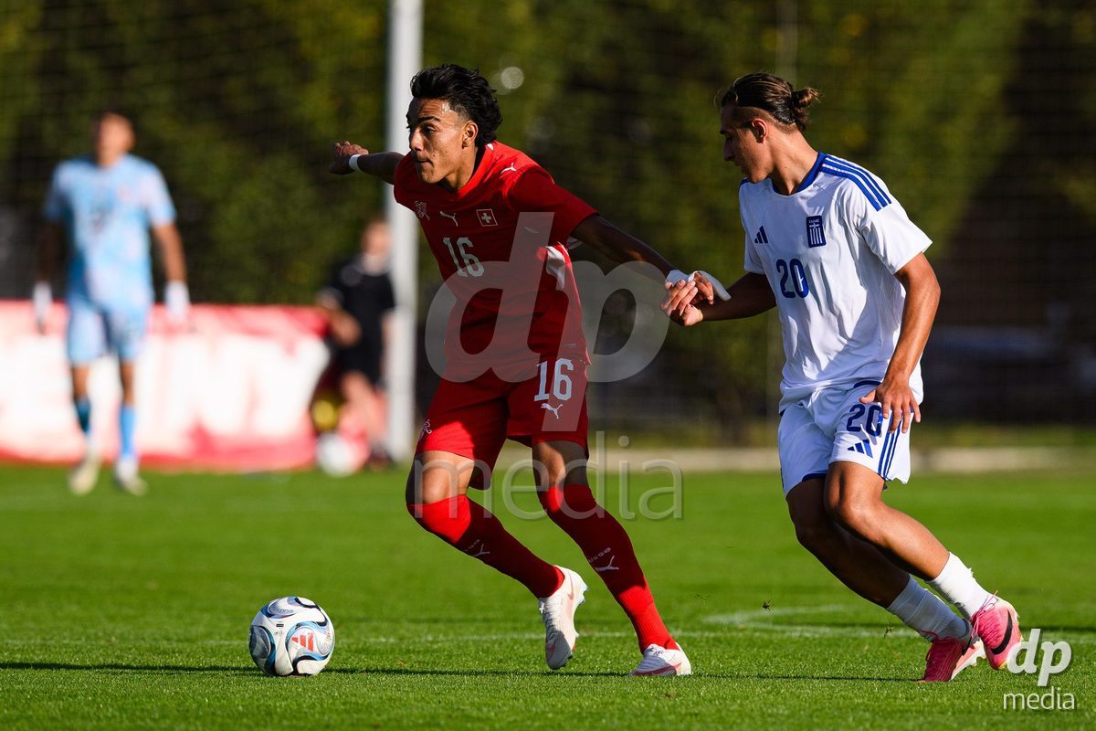 KOSMONSY, CZECH REPUBLIC - SEPTEMBER 30: Aaron Davis of Switzerland and Sarafianos Papasarafianos of Greece during the International Friendly match between Switzerland U18 and Greece U18 on September 30, 2026 in Kosmonsy, Czech Republic.