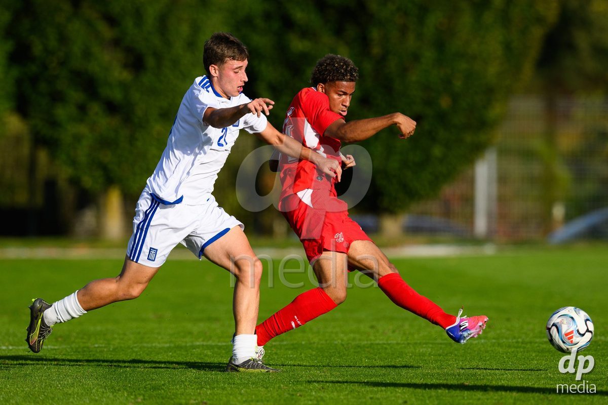 KOSMONSY, CZECH REPUBLIC - SEPTEMBER 30: Argyris Argyriou of Greece and Bascio Paolo of Switzerland during the International Friendly match between Switzerland U18 and Greece U18 on September 30, 2026 in Kosmonsy, Czech Republic.