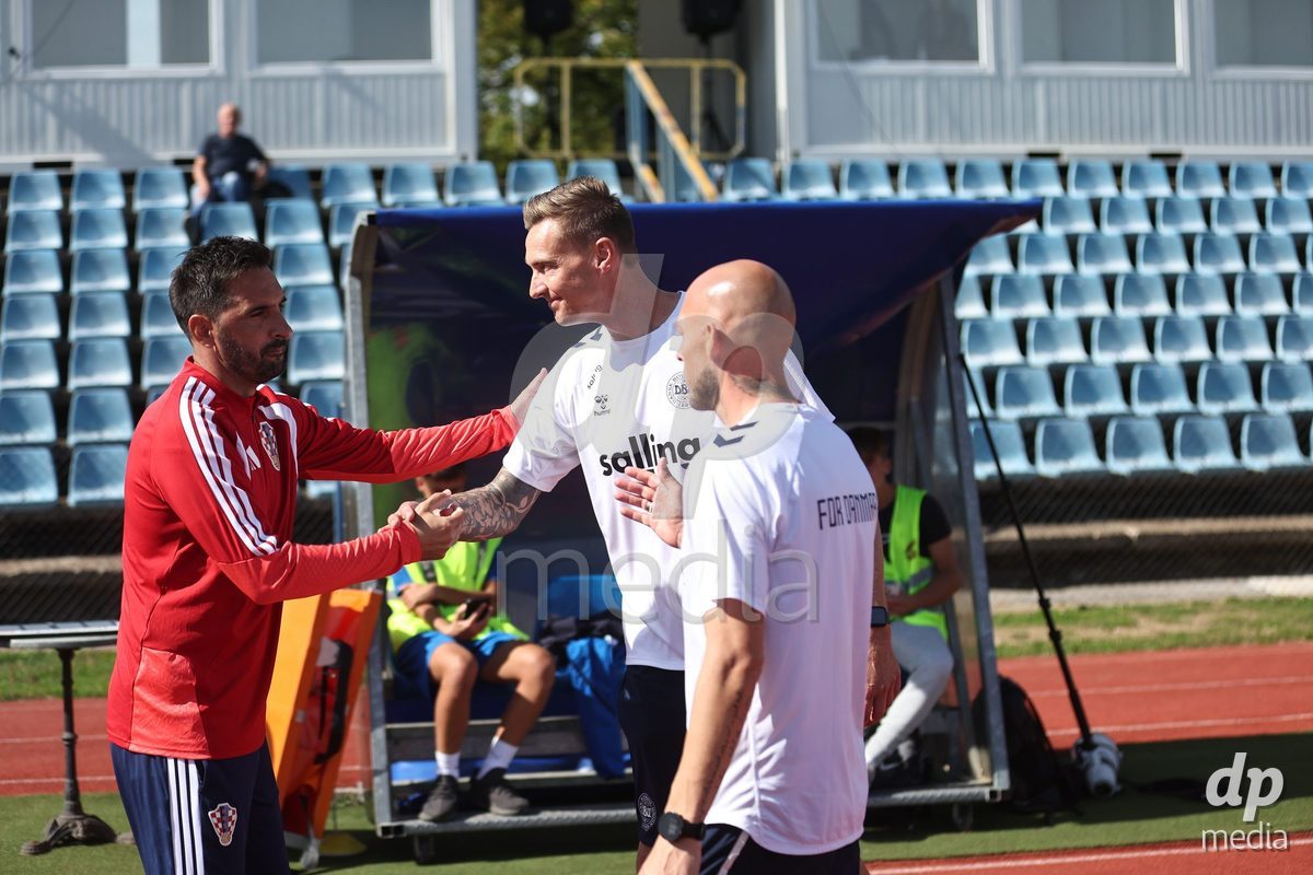 KARLOVAC, CROATIA - OCTOBER 2: Head Coach of Craotia Marijan Budimir and head coach of Denmark Mads Lyng shake hands during the International Friendly match between Denmark U18 and Croatia U18 at Branko Cavlovic-Cavlek Stadium on October 2, 2026 in Karlovac, Croatia. Photo: Slavko Midzor/Pixsell/DP Media