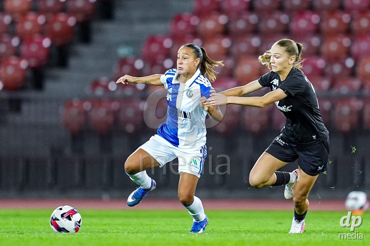 ZURICH, SWITZERLAND - OCTOBER 2: Dalila Belen Ippolito of Grasshopper Club Zurich (L) battles for the ball (duel)  during the AXA Women's Super League match between GC Frauenfussball and FC Zurich at Letzigrund on October 2, 2026 in Zurich, Switzerland.