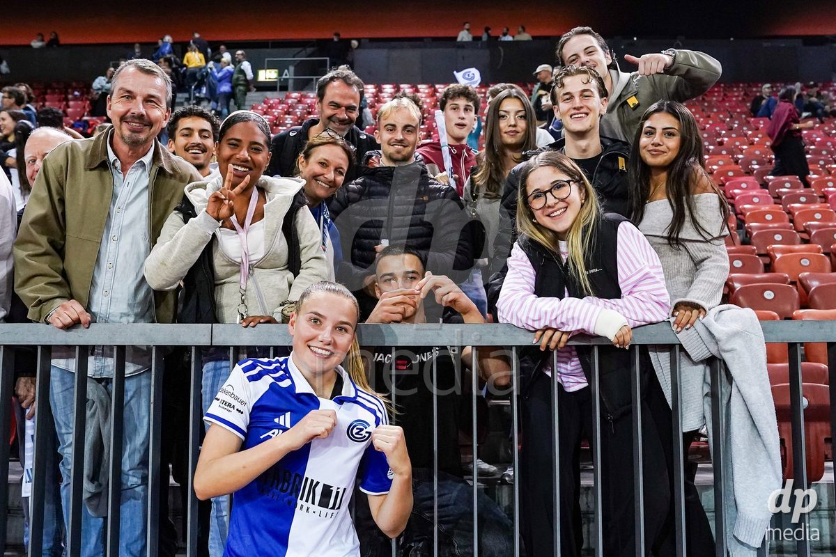 ZURICH, SWITZERLAND - OCTOBER 2: Fans with Giulia Looser of Grasshopper Club Zurich after the victory during the AXA Women's Super League match between GC Frauenfussball and FC Zurich at Letzigrund on October 2, 2026 in Zurich, Switzerland.
