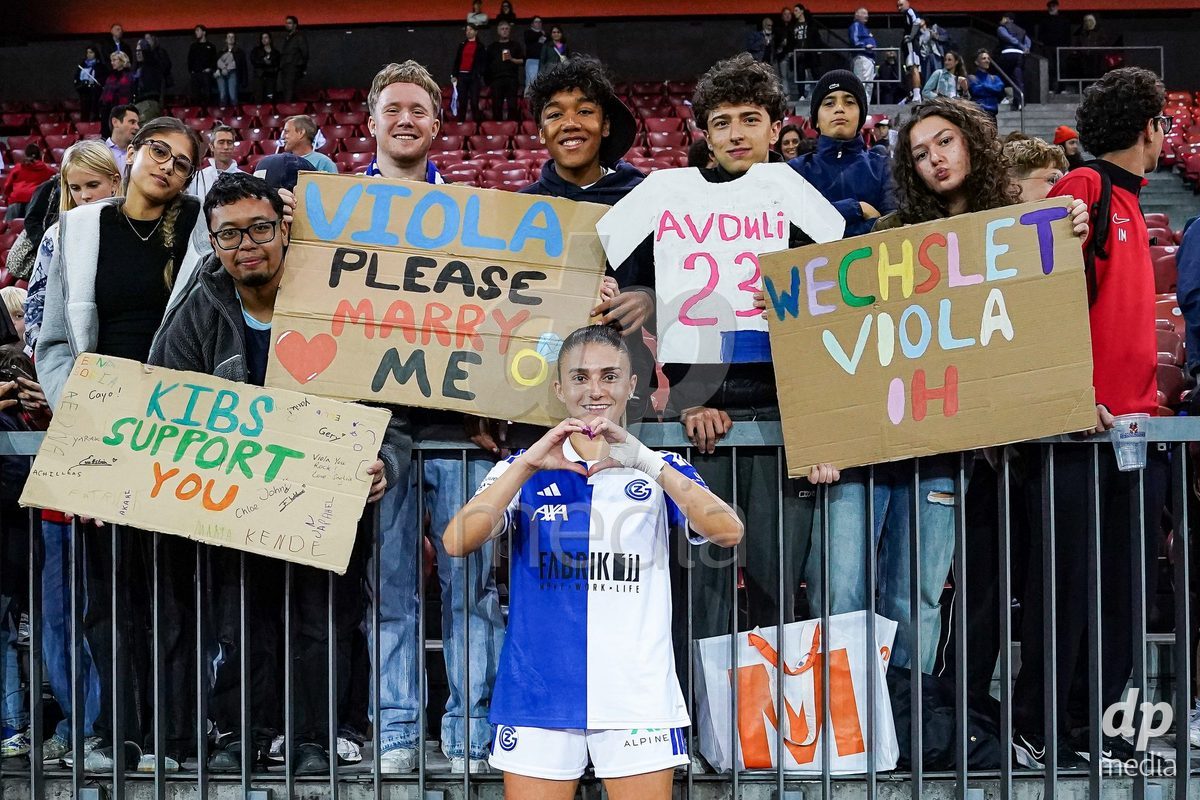 ZURICH, SWITZERLAND - OCTOBER 2: Fans with Viola Avduli of Grasshopper Club Zurich after the victory during the AXA Women's Super League match between GC Frauenfussball and FC Zurich at Letzigrund on October 2, 2026 in Zurich, Switzerland.