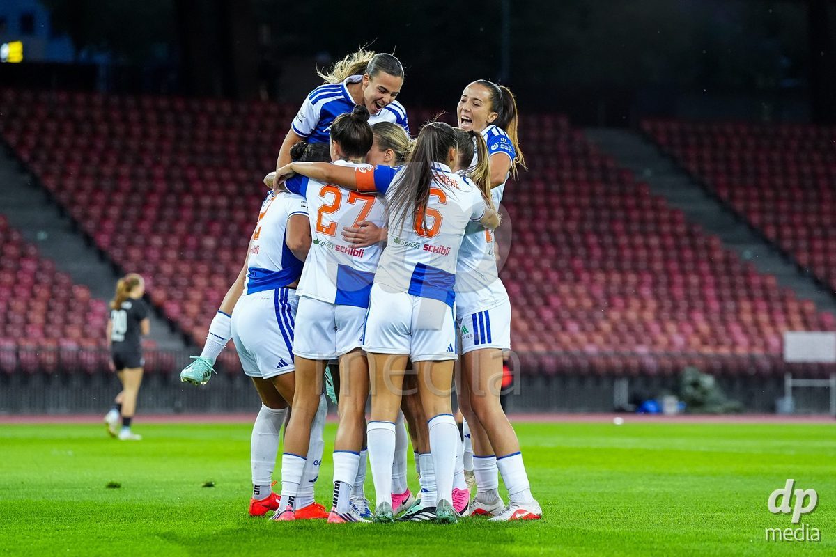 ZURICH, SWITZERLAND - OCTOBER 2: Kayla Mckenna of Grasshopper Club Zurich (L) celebrates with teammates after scoring her teams first goal during the AXA Women's Super League match between GC Frauenfussball and FC Zurich at Letzigrund on October 2, 2026 in Zurich, Switzerland.