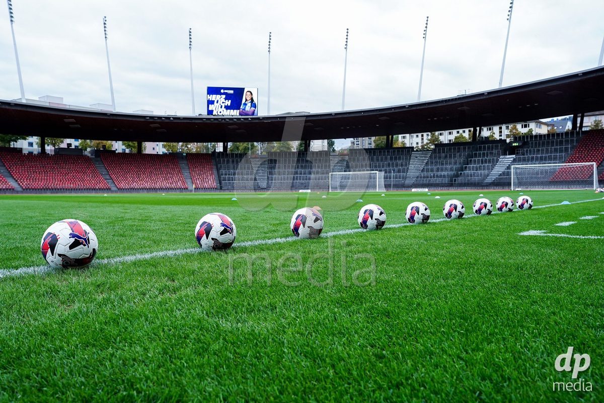 ZURICH, SWITZERLAND - OCTOBER 2: General view pitchside with the official matchball (AXA sponsor) inside the stadium prior to the AXA Women's Super League match between GC Frauenfussball and FC Zurich at Letzigrund on October 2, 2026 in Zurich, Switzerland.