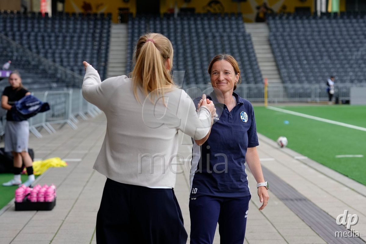 BERN, SWITZERLAND - OCTOBER 3: Head Coach Luzia Odermatt (FCL) with Head Coach Imke Annita Wubbenhorst (YB Frauen) before the AXA Women's Super League match between BSC YB Frauen and FC Luzern at Wankdorf Stadion on October 3, 2026 in Bern, Switzerland.