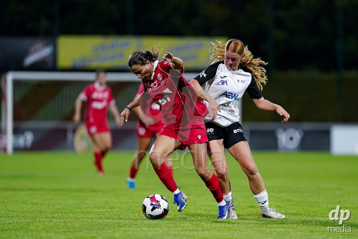 RAPPERSWIL, SWITZERLAND - OCTOBER 3: Yves Milva Heim of FC Aarau Frauen (R) and Evdokia Dimitrova Popadinova of FC Rapperswil-Jona (L) battle for the ball during the AXA Women's Super League match between FC Rapperswil-Jona and FC Aarau Frauen at Grunfeld on October 3, 2026 in Rapperswil, Switzerland.