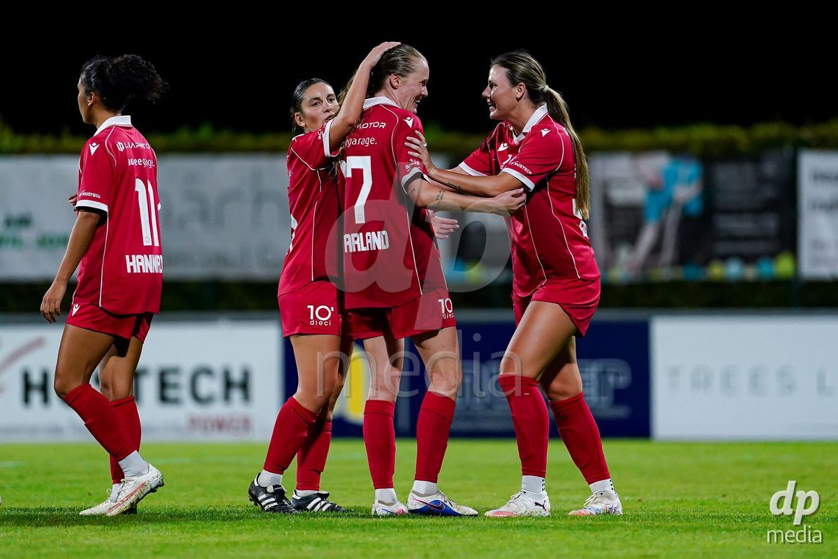 RAPPERSWIL, SWITZERLAND - OCTOBER 3: Leyla Mcfarland of FC Rapperswil-Jona celebrating with team after scoring penalty during the AXA Women's Super League match between FC Rapperswil-Jona and FC Aarau Frauen at Grunfeld on October 3, 2026 in Rapperswil, Switzerland.