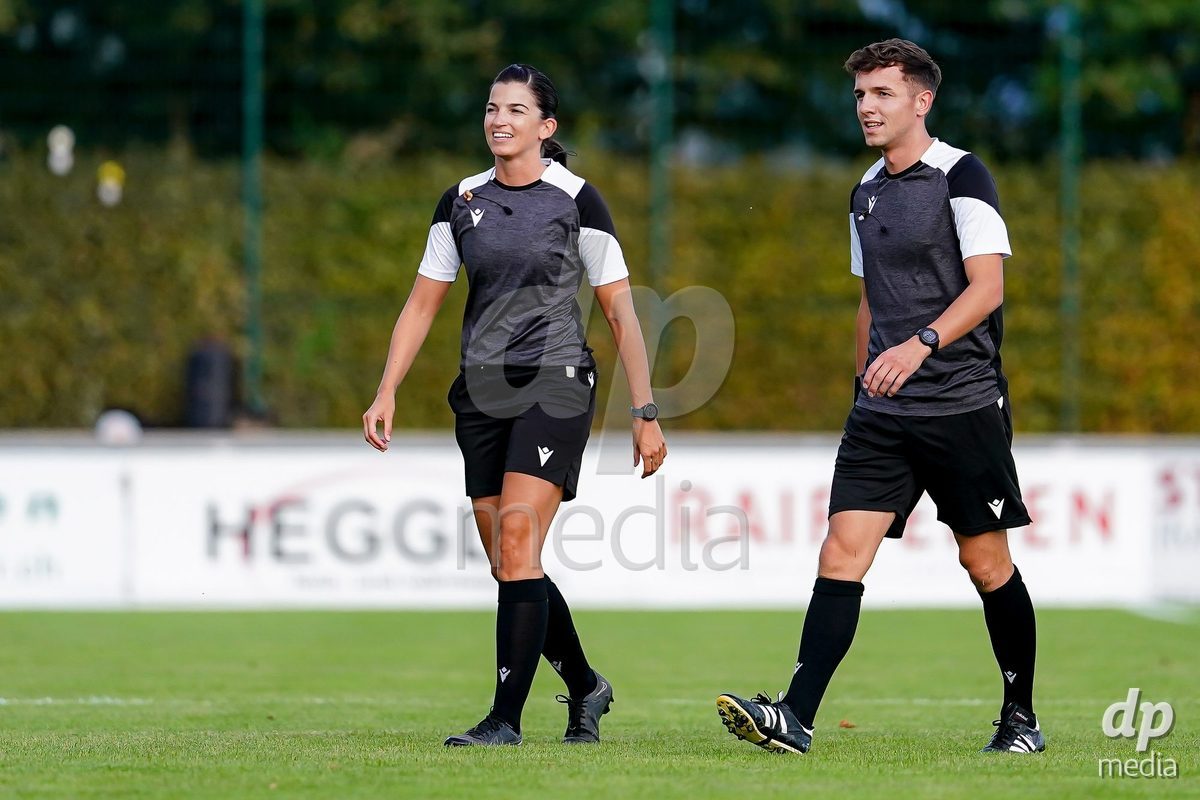 RAPPERSWIL, SWITZERLAND - OCTOBER 3: Referee Nathan Liniger (R) and Referee Sabrina Keinersdorfer (L) prior to the AXA Women's Super League match between FC Rapperswil-Jona and FC Aarau Frauen at Grunfeld on October 3, 2026 in Rapperswil, Switzerland.