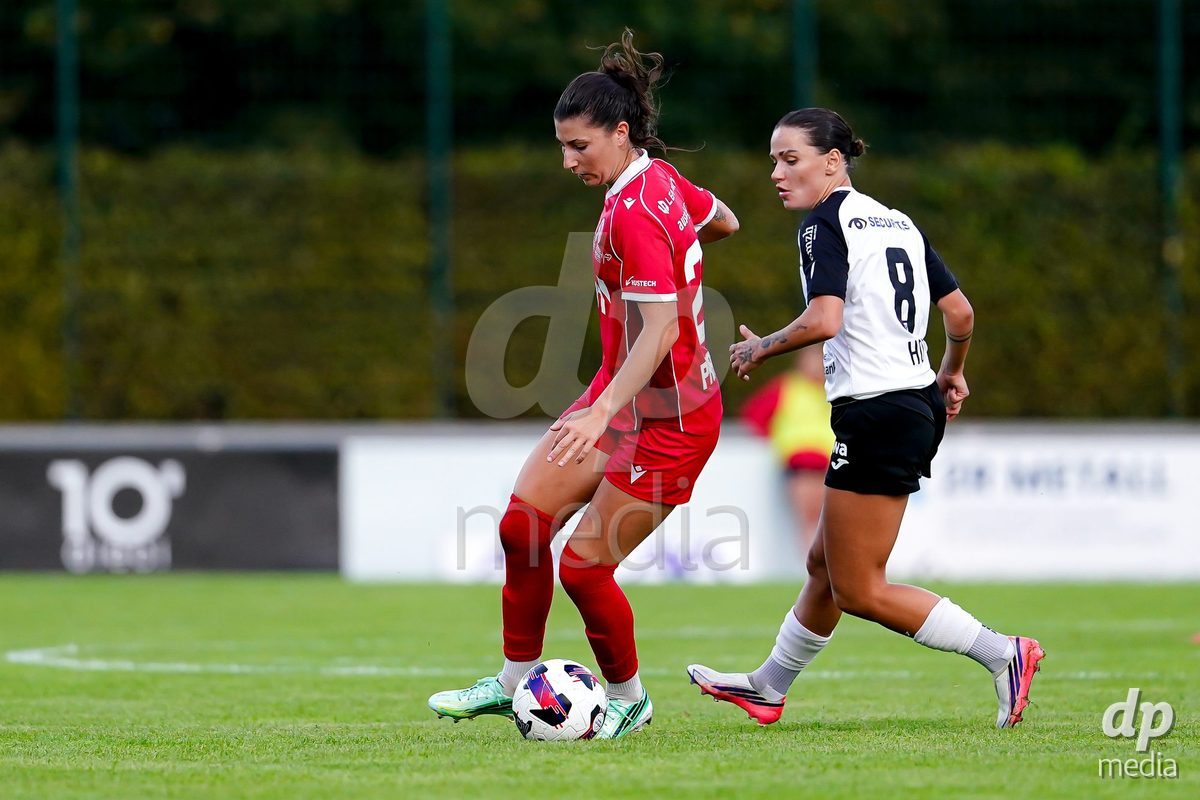 RAPPERSWIL, SWITZERLAND - OCTOBER 3: Zdravka Petrova Parapunova of FC Rapperswil-Jona (L) controls the ball during the AXA Women's Super League match between FC Rapperswil-Jona and FC Aarau Frauen at Grunfeld on October 3, 2026 in Rapperswil, Switzerland.