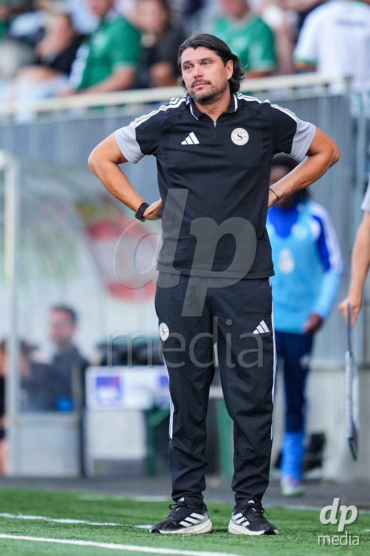 WIL, SWITZERLAND - OCTOBER 4: Cristian Damian Toro, Head Coach of Servette FC Chenois Feminin reacts during the AXA Women's Super League match between FC St. Gallen 1879 and Servette FC Chenois Feminin at Lidl Sportpark on October 4, 2026 in Wil, Switzerland.