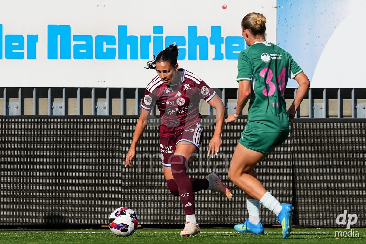WIL, SWITZERLAND - OCTOBER 4: Meriame Terchoun of Servette FC Chenois Feminin (L) and Johanna Thuer of FC St. Gallen (R) battle for the ball (duel) during the AXA Women's Super League match between FC St. Gallen 1879 and Servette FC Chenois Feminin at Lidl Sportpark on October 4, 2026 in Wil, Switzerland.