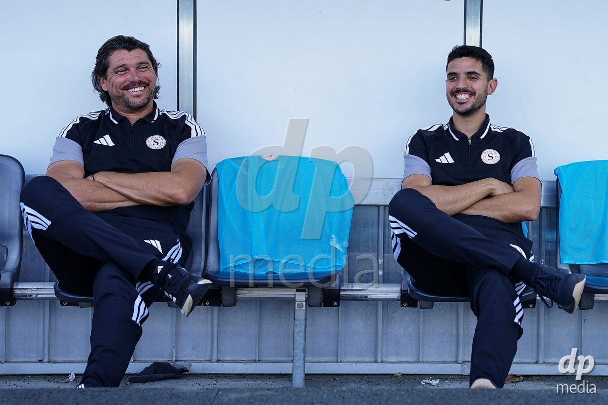 WIL, SWITZERLAND - OCTOBER 4: Cristian Damian Toro, Head Coach of Servette FC Chenois Feminin (L) and team manager Jorge Daries prior to the AXA Women's Super League match between FC St. Gallen 1879 and Servette FC Chenois Feminin at Lidl Sportpark on October 4, 2026 in Wil, Switzerland.