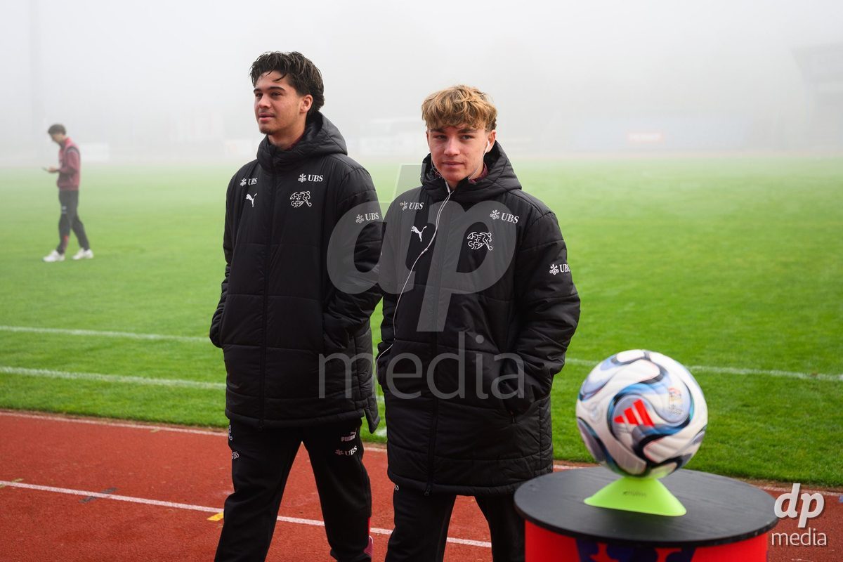 USTI NAD LABEM, CZECH REPUBLIC - OCTOBER 3:   Timo Wiesner (left) and Luc Gigo of Switzerland  team's pitch inspection of the stadium before the International Friendly match between Slovakia and Switzerland on October 3, 2026 in Ustí nad Labem, Czech Republic.