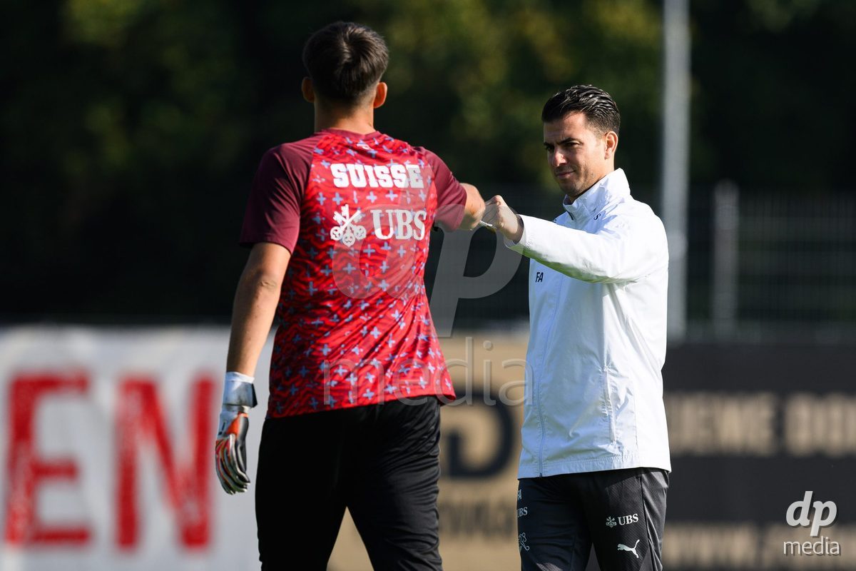 USTI NAD LABEM, CZECH REPUBLIC - OCTOBER 3: Dylan Sgarbi of Switzerland and assistant coach Francesco Azzarito during warm up before the International Friendly match between Slovakia and Switzerland on October 3, 2026 in Ustí nad Labem, Czech Republic.