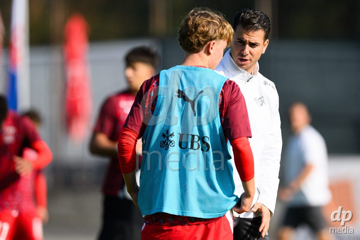 USTI NAD LABEM, CZECH REPUBLIC - OCTOBER 3: Luc Gigon of Switzerland and assistant coach Francesco Azzarito during warm up before the International Friendly match between Slovakia and Switzerland on October 3, 2026 in Ustí nad Labem, Czech Republic.
