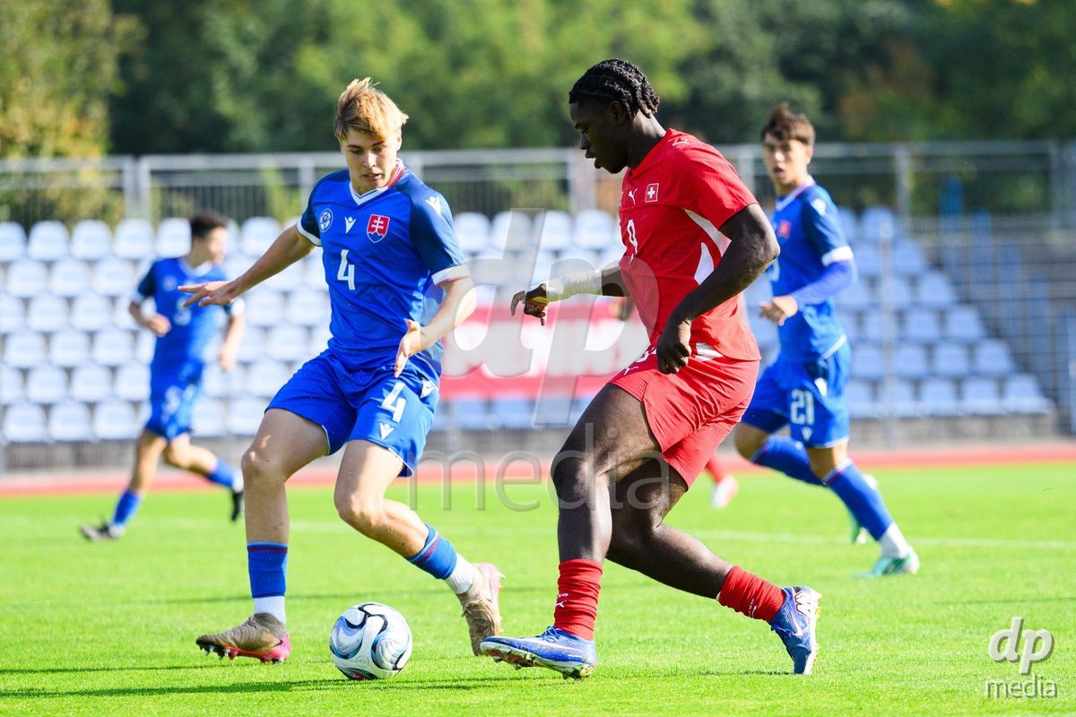 USTI NAD LABEM, CZECH REPUBLIC - OCTOBER 3: Tomas Durko of Slovakia (left) and Shedrach Ogbodu of Switzerland during the International Friendly match between Slovakia and Switzerland on October 3, 2026 in Ustí nad Labem, Czech Republic.
