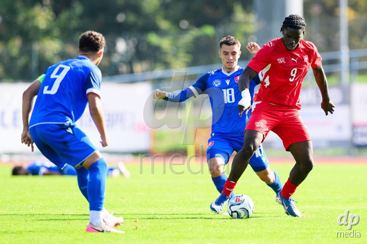 USTI NAD LABEM, CZECH REPUBLIC - OCTOBER 3: Shedrach Ogbodu of Switzerland and Tobias Jan Mirko of Slovakia during the International Friendly match between Slovakia and Switzerland on October 3, 2026 in Ustí nad Labem, Czech Republic.