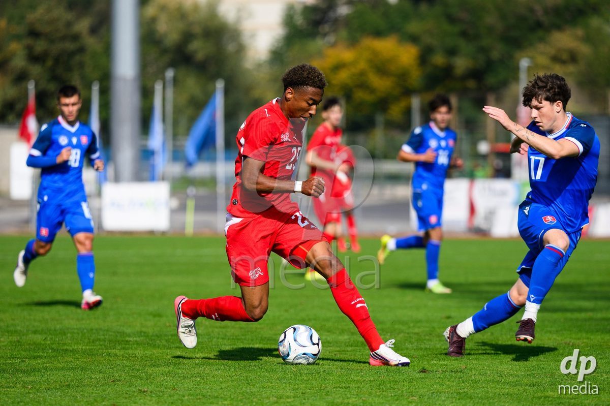 USTI NAD LABEM, CZECH REPUBLIC - OCTOBER 3: Mathis Dind of Switzerland and Simon Pobijak of Slovakia during the International Friendly match between Slovakia and Switzerland on October 3, 2026 in Ustí nad Labem, Czech Republic.