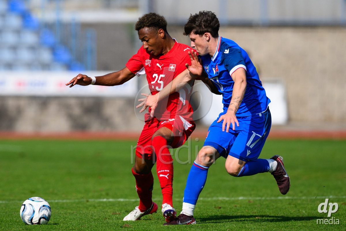 USTI NAD LABEM, CZECH REPUBLIC - OCTOBER 3: Mathis Dind of Switzerland (left) and Simon Pobijak of Slovakia during the International Friendly match between Slovakia and Switzerland on October 3, 2026 in Ustí nad Labem, Czech Republic.