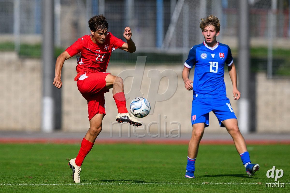 USTI NAD LABEM, CZECH REPUBLIC - OCTOBER 3: Gregorijan Mihajlovski of Switzerland (left) and Milan Vicena of Slovakia during the International Friendly match between Slovakia and Switzerland on October 3, 2026 in Ustí nad Labem, Czech Republic.