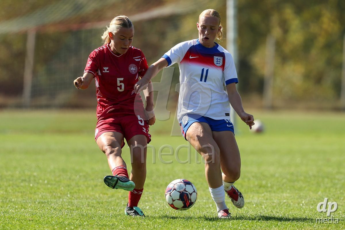 KAKANJ, BOSNIA AND HERZEGOVINA - OCTOBER 7: Astrid Engsig-Karup of Denmark and Phoebe De Bohan of England during the UEFA Womens European Under-19 Qualifier match between England and Denmark at Mladost Stadium on October 7, 2026 in Kakanj, Bosnia and Herzegovina.